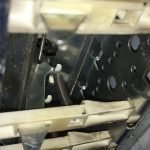 Spring attached to the trigger.