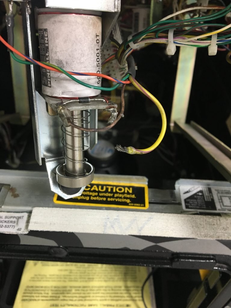 ball exit popper bracket