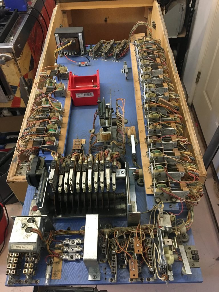 Bottom panel pulled out for servicing