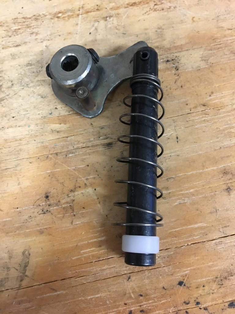 Pawl and plunger assembly