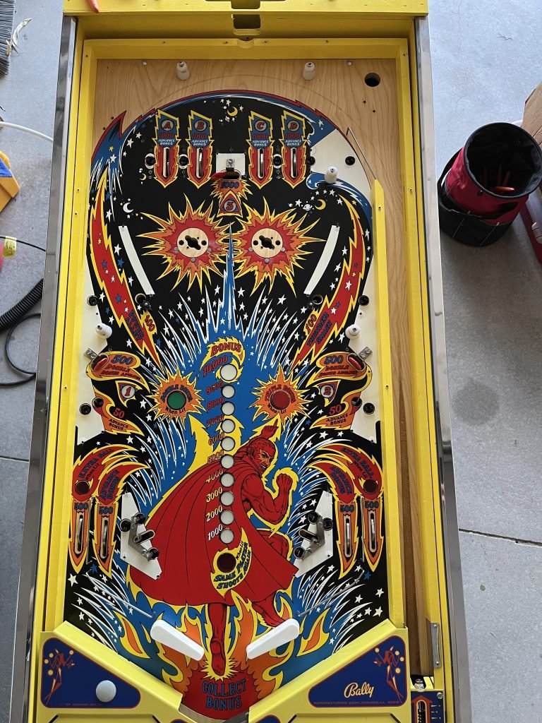Playfield stripped and being cleaned