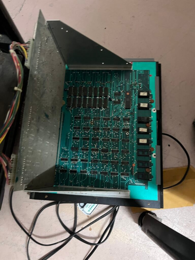 Dirty Space Invaders motherboard before repair